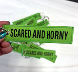 The Hunt : Scared and Horny Jet Tag Keychain